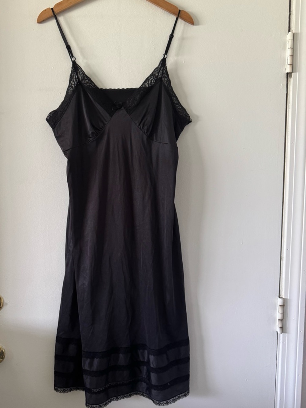 Adonna nylon full slip features delicate lace trim along the neckline tiered
